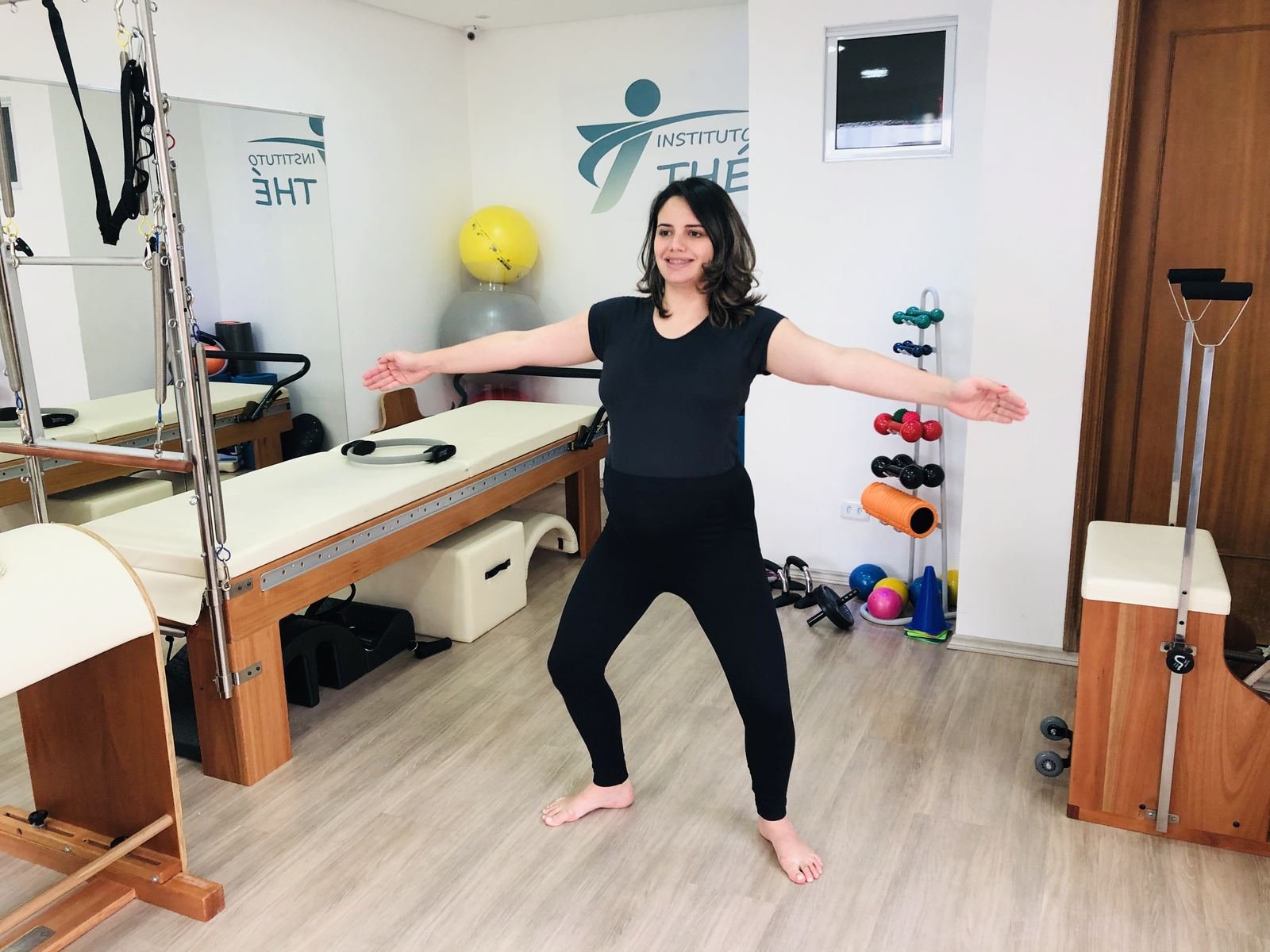 Instrutora no estúdio de Pilates do Instituto Thé